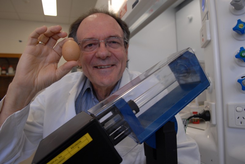 Colin Raston with the Vortex Fluidic Device - also called the 'unboil an egg' machine